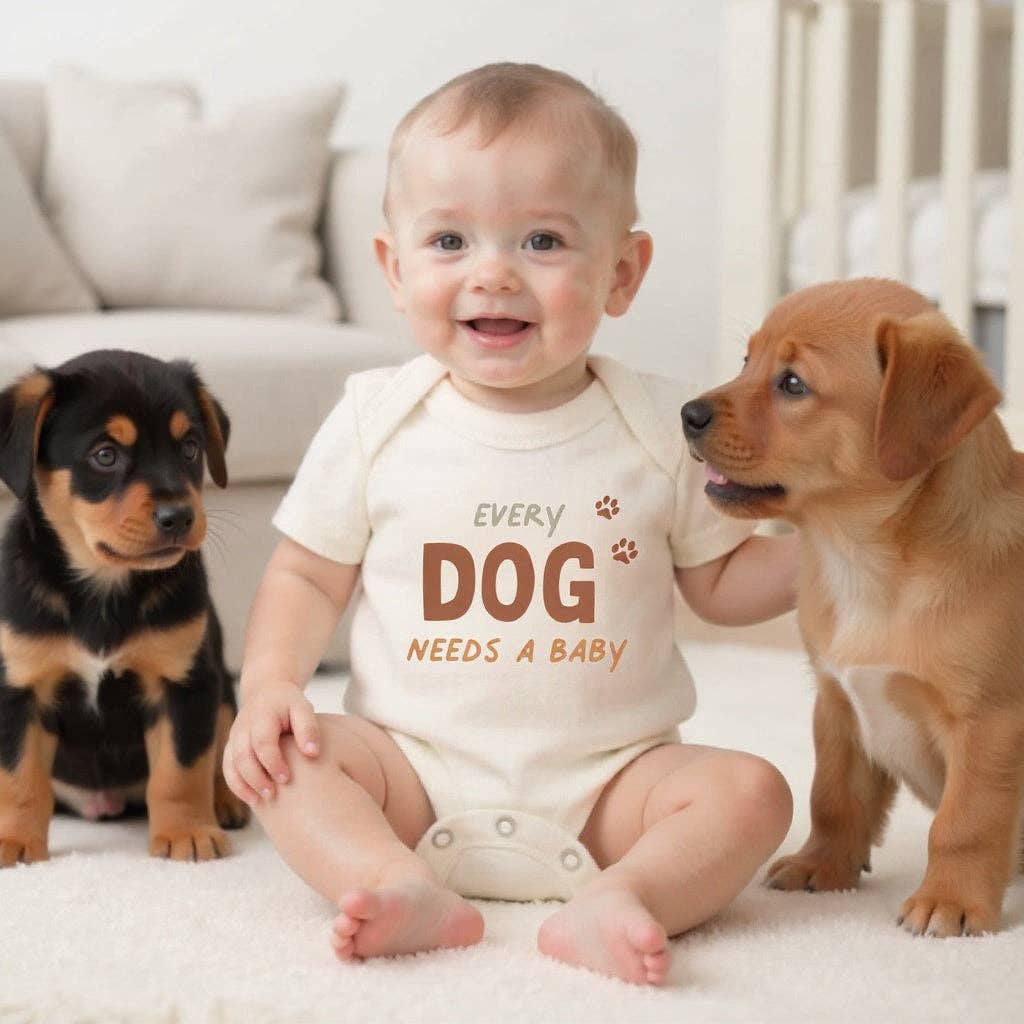 Organic "Every Dog Needs a Baby" Bodysuit
