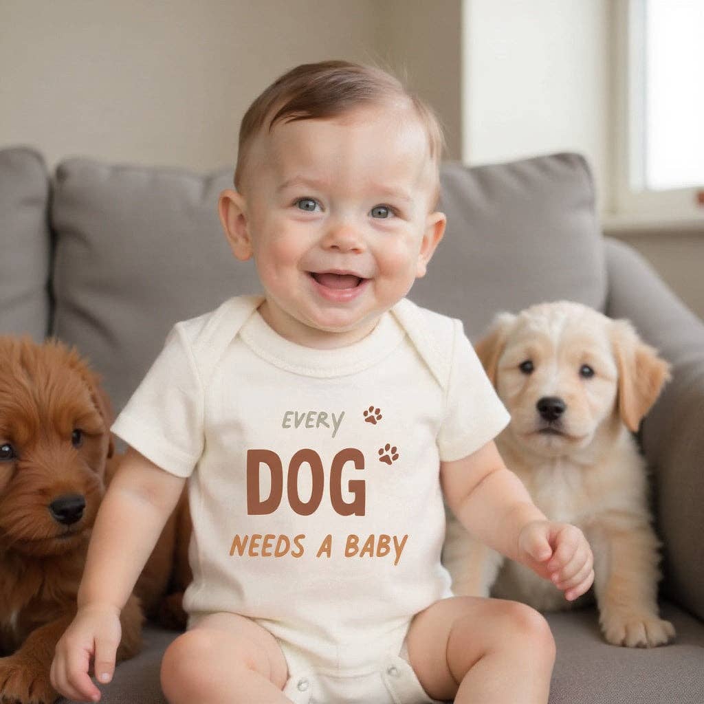 Organic "Every Dog Needs a Baby" Bodysuit